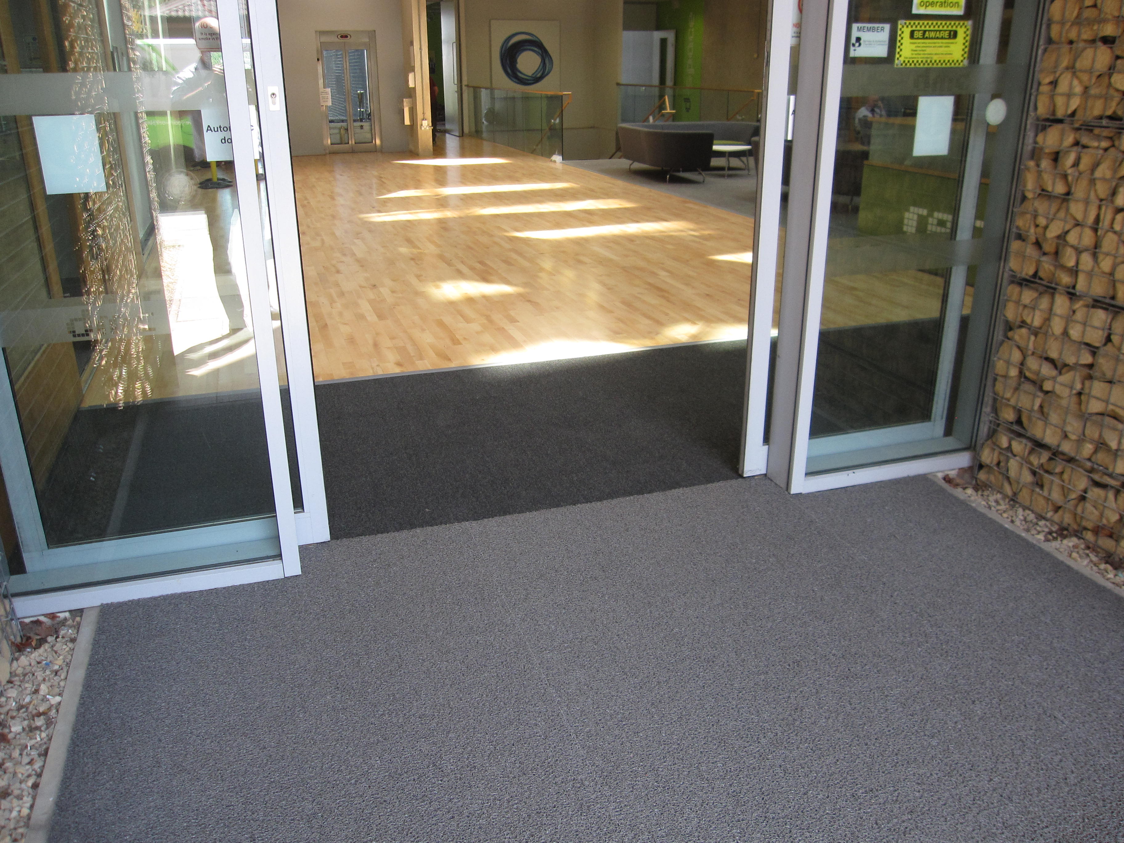 A Cumberlidge install new flooring at the Digital Media Centre in Barnsley