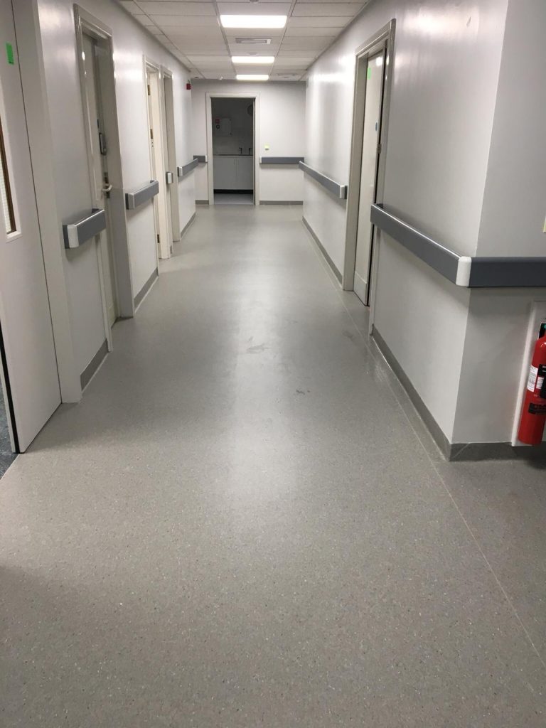 The finished corridor featuring Tarkett iQ Granit sheet vinyl