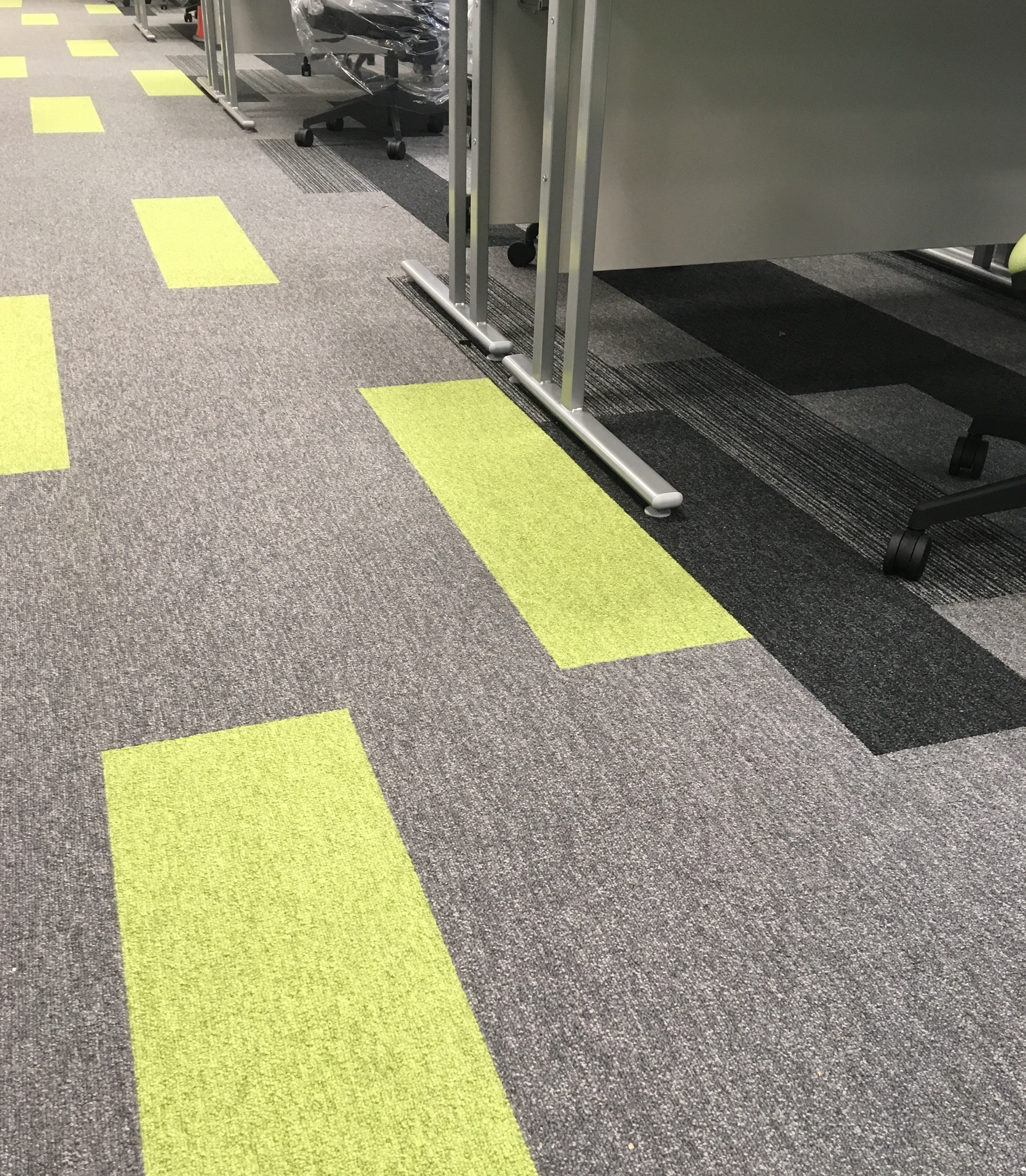 A Cumberlidge install new flooring throughout the new Patients' Booking Hub for Sheffield Teaching Hospitals NHS Foundation Trust