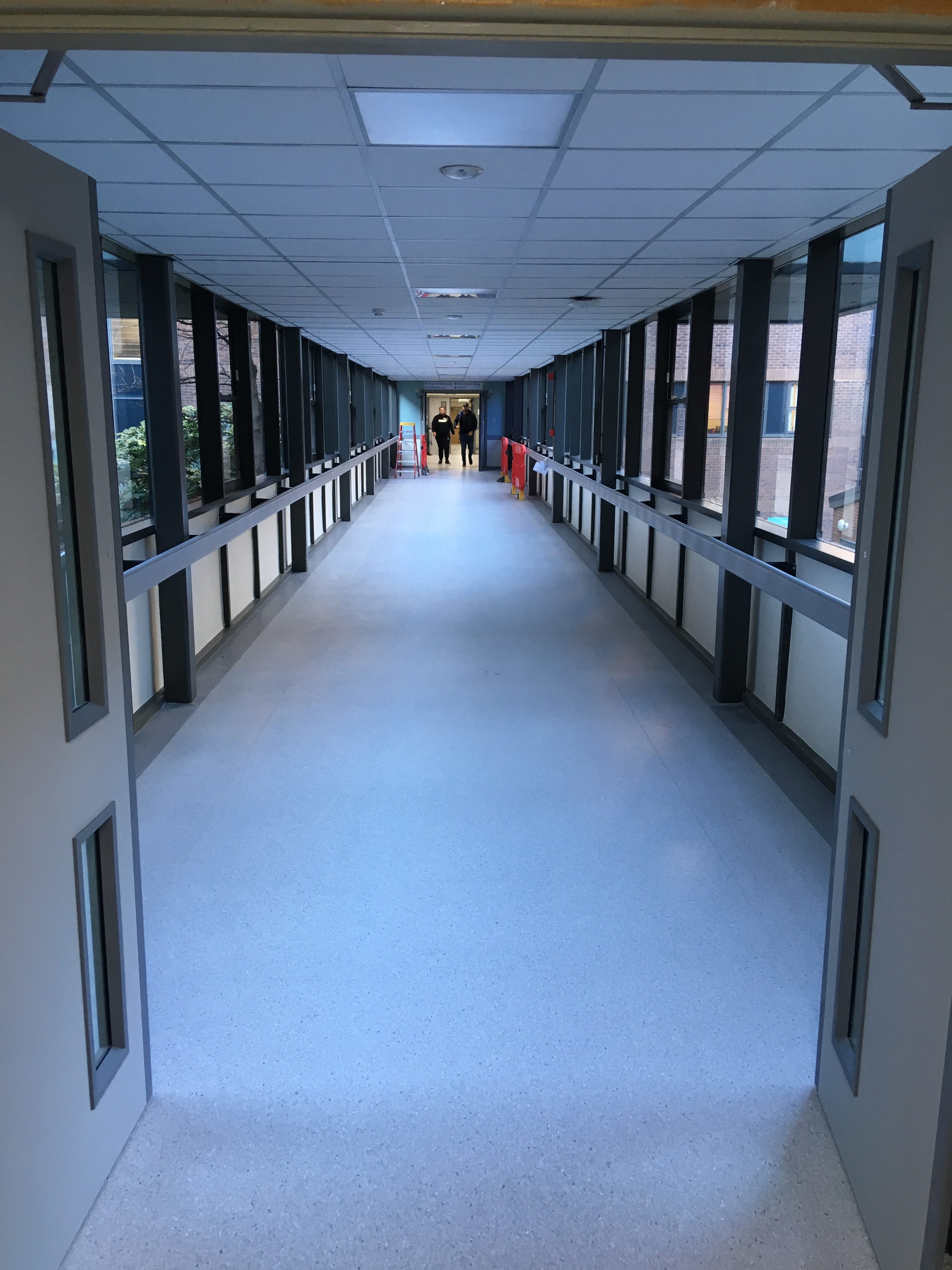 After: The corridor entrance and corridor as work is completed - a total transformation!